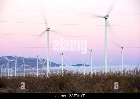 Part of the Tehachapi Pass wind farm, the first large scale wind farm area developed in the US, California, USA, at sunrise. Stock Photo