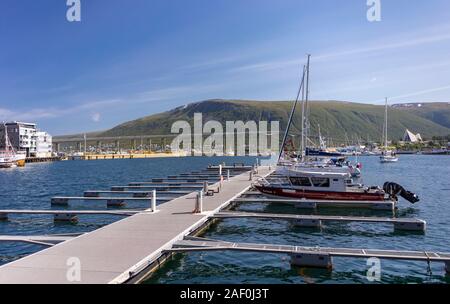 TROMSØ, NORWAY - Empty docks in harbor marina. Stock Photo
