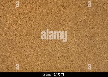 Yellow chipboard texture molded slabs of wood waste. Stock Photo