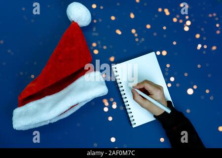 Man writes plans and goals. Stock Photo