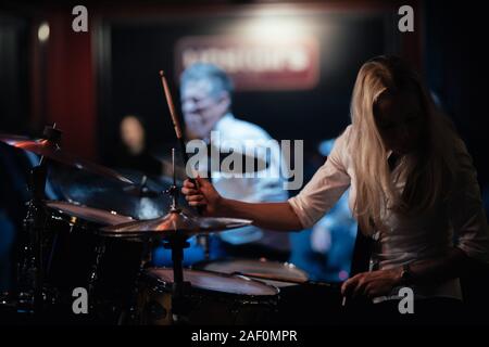 Sophie Alloway playing drums in London. Stock Photo