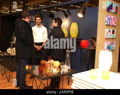 Prague, Czech Republic. 11th Dec, 2019. Visitors learn about crystal or glass products at the exhibition of Czech Design Week in Prague, the Czech Republic, Dec. 11, 2019. The Czech Design Week brings together the works of more than 150 designers from around the world, and also hosts a series of lectures and forums. The entire event will last till the Dec. 15. Credit: Dana Kesnerova/Xinhua/Alamy Live News Stock Photo