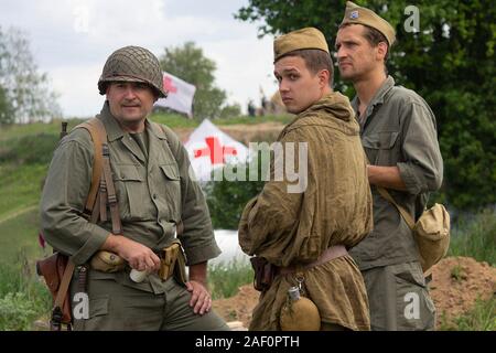 Kiev, Ukraine - May 9, 2018: Mens in the uniform of soldiers of the Soviet American army of the Second World War on historical reconstruction on the a Stock Photo