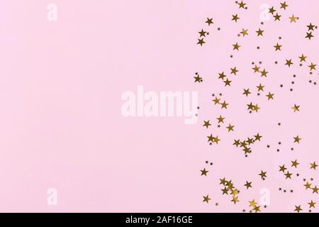 Golden Glitter Confetti Sparkles Pastel Pink Background Flat Lay Top Stock  Photo by ©IrynaBudanova 596190940
