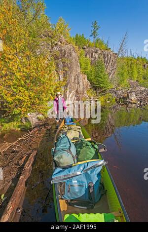 Canoe Finally Over the Beaver Dam on Muskeg Lake in the Boundary Waters in Minnesota Stock Photo