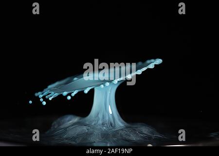 High resolution high megapixel image of a water drop splash with  blue, and baby blue, representing themes of change, impact, gender, boy Stock Photo