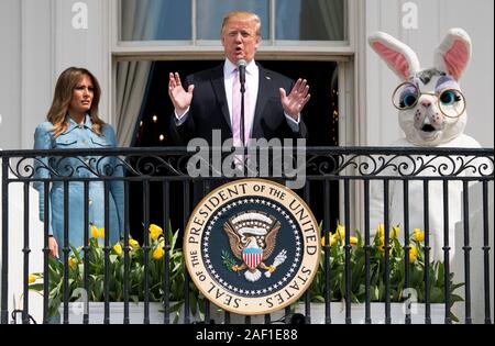 Washington, United States. 12th Dec, 2019. President Donald Trump, accompanied by First Lady Melania Trump and the Easter Bunny, delivers remarks at the White House Easter Egg Roll at the White House in Washington, DC, on April 22, 2019. Photo by Kevin Dietsch/UPI Credit: UPI/Alamy Live News Stock Photo