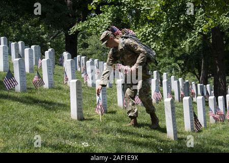 Arlington, United States. 12th Dec, 2019. Old Guard U.S. Army soldiers place American flags at the tombstones of the fallen at Arlington National Cemetery in Arlington, Virginia, on May 23, 2019. More than 250,000 flags are placed on the tomb sites prior to Memorial Day. Photo by Pat Benic/UPI Credit: UPI/Alamy Live News Stock Photo