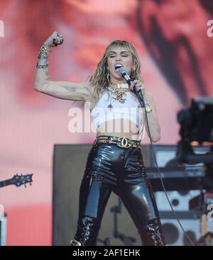 Somerset, UK. 12th Dec, 2019. American singer Miley Cyrus performs on the Pyramid stage at Glastonbury Music Festival in Somerset, England, on Sunday, June 30, 2019. The three-day event is the largest music festival in Europe, with over 120,000 festival-goers attending. Photo by Hugo Philpott/UPI Credit: UPI/Alamy Live News Stock Photo