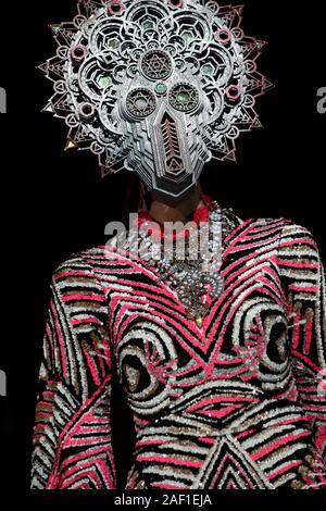 Paris, France. 12th Dec, 2019. A model takes to the catwalk during the presentation of Manish Arora's show as part of the Fall-Winter 2019-2020 Paris Fashion Week on February 28, 2019. Photo by Eco Clement/UPI Credit: UPI/Alamy Live News Stock Photo
