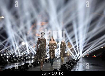 Paris, France. 12th Dec, 2019. A model takes to the catwalk during Saint Laurent's show as part of the presentation of the Spring-Summer 2020 Ready-to-Wear collections during Paris Fashion Week in Paris on September 24, 2019. Photo by Eco Clement/UPI Credit: UPI/Alamy Live News Stock Photo