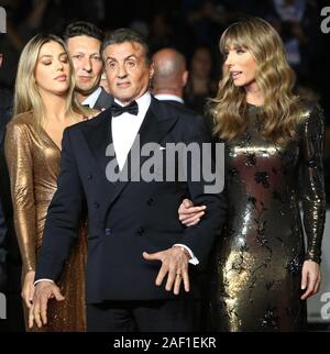 Cannes, France. 12th Dec, 2019. Sylvester Stallone, his daughter Sophia Stallone (L) and his wife Jennifer Flavin (R) arrive on the red carpet before the screening of the film 'Rambo: First Blood' at the 72nd annual Cannes International Film Festival in Cannes, France on May 24, 2019. Photo by David Silpa/UPI Credit: UPI/Alamy Live News Stock Photo