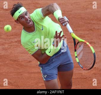 Paris, France. 12th Dec, 2019. Rafael Nadal of Spain hits a serve during his French Open men's final match against Dominic Thiem of Austria at Roland Garros in Paris on June 9, 2019. Photo by David Silpa/UPI Credit: UPI/Alamy Live News Stock Photo