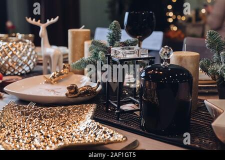 Holiday table ready for New Year celebration Stock Photo