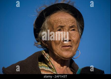 Sapa, Lao Cai, Vietnam - March 20, 2011: Traditional Black Hmong ethnicity senior woman in a rural areas of Sapa Stock Photo