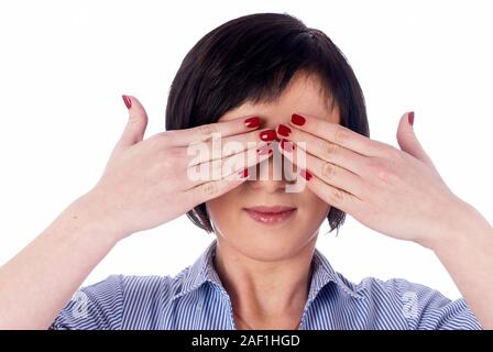 Woman covering eyes Stock Photo