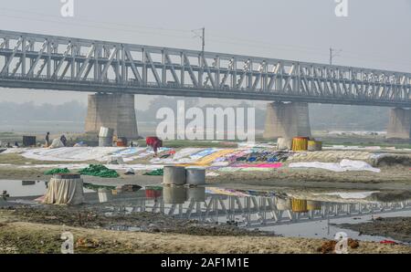 Agra, India - Nov 12, 2017. Steel bridge with Yamuna River at misty day in Agra, India. Air pollution in India is a serious health issue. Stock Photo