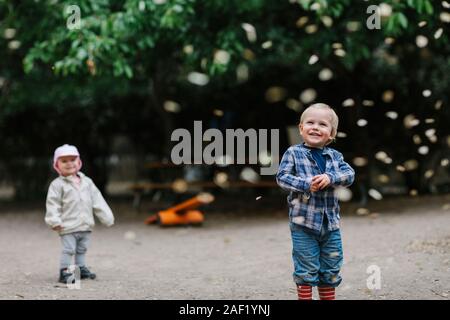 Smiling boy looking away Stock Photo
