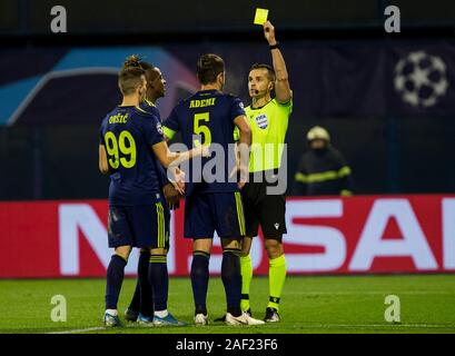 Zagreb, Croatia. 11th Dec, 2019. Referee Carlos del Cerro Grande of ESP gives yellow card to Arijan Ademi of Dinamo Zagreb. Credit: Nikola Krstic/Alamy Live News Stock Photo
