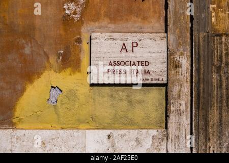 Name plate with AP Associated Press Italia written on it at a house wall Stock Photo