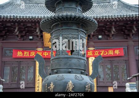 Jiangsu Province, China - October 2019: Giant urn, Qingyu  buddhist temple, Shang Xian wetlands park. Wuxi Stock Photo
