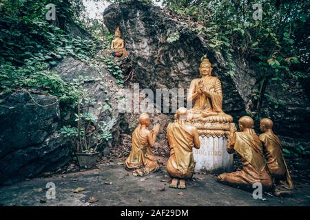 Buddha at Mount Phou Si, also written Mount Phu Si, is a 100 m high hill in the centre of the old town of Luang Prabang in Laos Stock Photo