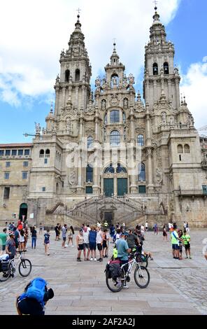 Pilgrims taking pictures in front of Cathedral at Praza do Obradoiro. Santiago de Compostela, Spain. Aug 4, 2019.