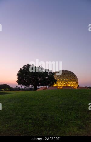 AUROVILLE, INDIA - December 2019: The Matrimandir at sunset Stock Photo