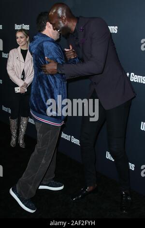 HOLLYWOOD, LOS ANGELES, CALIFORNIA, USA - DECEMBER 11: Adam Sandler and Kevin Garnett arrive at the Los Angeles Premiere Of A24's 'Uncut Gems' held at the ArcLight Cinerama Dome on December 11, 2019 in Hollywood, Los Angeles, California, United States. (Photo by Xavier Collin/Image Press Agency) Stock Photo