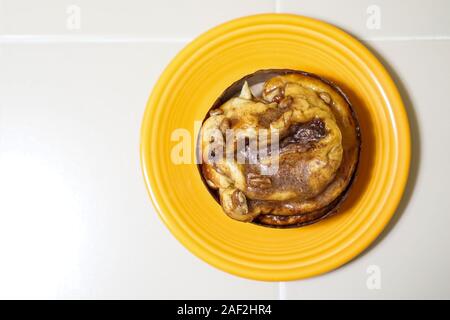 Sticky bun on a plate Stock Photo