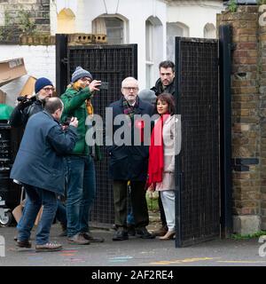 London, UK. 12th Dec, 2019. Jeremy Corbyn and his wife Laura Alvarez at polling station during the General Elections. London, UK.  Credit: dpa picture alliance/Alamy Live News Stock Photo