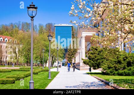 People at park with street lights in Rogaska Slatina Stock Photo