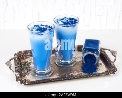 This blue latte is colored with natural phycocyanin extracted from blue spirulina algae Stock Photo