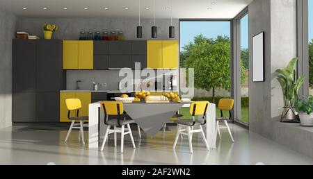 Black and yellow modern kitchen with dining table - 3d rendering Stock Photo