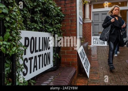 Wandsworth, London, UK. 12th Dec, 2019. Balham Library - Despite the grim weather people seem determined to vote in the General Election. There is a steady flow of people into and out of the polling stations in Wandsworth. Credit: Guy Bell/Alamy Live News Stock Photo