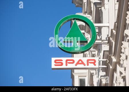VIENNA, AUSTRIA - NOVEMBER 6, 2019: Spar logo on one of their Supermarkets in Vienna. Spar is a Dutch franchise of retailers and wholesalers, operatin Stock Photo