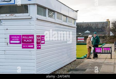 Gullane Bowling Club, East Lothian, Scotland, United Kingdom, 12th December 2019. UK election: voters at the local polling place Stock Photo