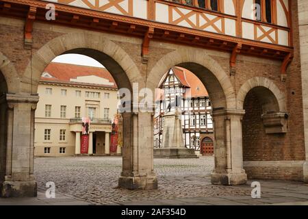 Historic half-timbered houses in the old town of Braunschweig, Lower Saxony, Germany. Castle Square with Brunswick Lion statue and Guild House. Stock Photo