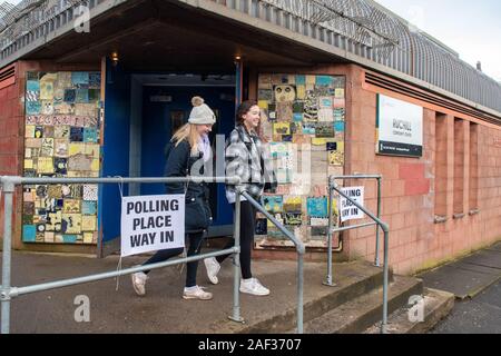 Ruchill, Glasgow, Scotland, UK - 12 December 2019: UK Elections - young voters leaving polling station at Ruchill Community Education Centre after voting in the Glasgow North Constituency, Scotland Stock Photo