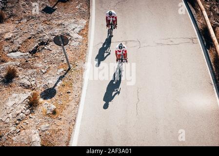 Couple together on road bicycle Stock Photo