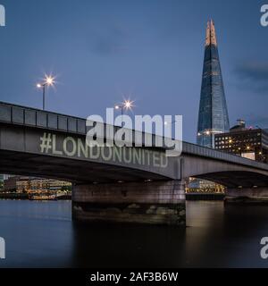 A #londonunited sign is projected onto London Bridge following the terrorist attack on the bridge. Stock Photo