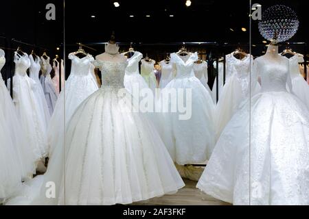 A lot of beautiful wedding dresses on display Stock Photo