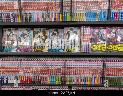 Manga comics on shelves in bookshop, Kyoto, Japan Stock Photo