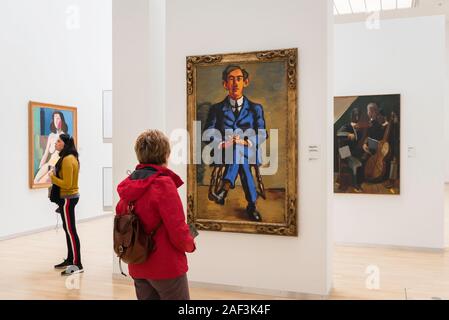 Art woman, view of women looking at paintings in the Statens Museum for Kunst (National Gallery) in central Copenhagen, Denmark. Stock Photo