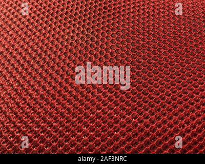 Synthetic fabric texture, red cell, nice background pattern. For upholstery of furniture. Stock Photo