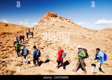 Trekkers in the Jebel Sirwa region of the Anti Atlas mountains of Morocco, North Africa. Stock Photo