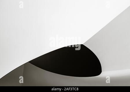 Spiral staircase. Abstract modern architecture. Black and white closeup photo of interior fragment with metaphorical relation to progress or developme Stock Photo