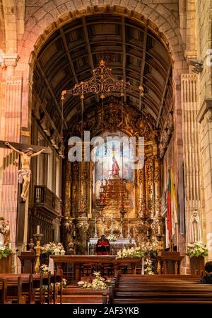Guimaraes, Portugal - 18 August 2019: Interior and altar of the Igreja de Nossa Senhora da Oliveira Stock Photo