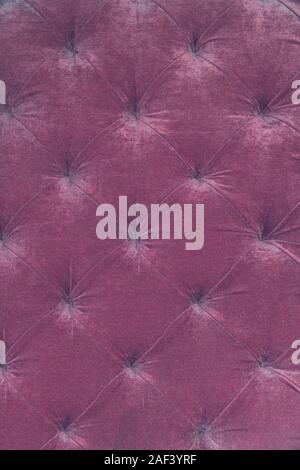Red Background Texture of the sofa upholstery Stock Photo