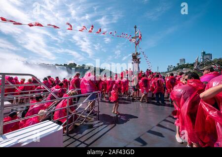 A view of the Niagara Falls from the maid of the mist. Stock Photo